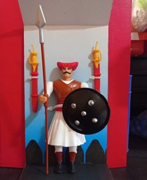 Picture of Mavala Toy with Spear and Shield - A Moveable Figurine and Cultural Inspiration for Kids | Teach Values and Enhance Home Decor with Regal Touches.